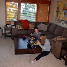 Hannah and Luke eat supper at the beach house on Whidbey Island