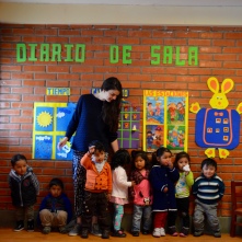One of The other Up Close volunteers (Chloe) working with kids at the Children's Center (Mallasa Bolivia)