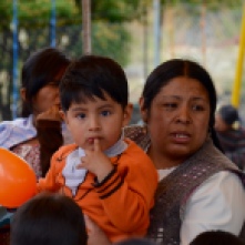 One of the kids and his mother at the graduation ceremony (Mallasa Bolivia)