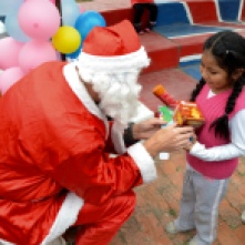Handing out gifts at the Children's Center (Mallasa Bolivia)