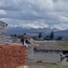 Houses built of both mud brick and normal brick (Bolivia)