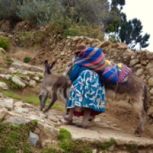 Lady and her donkeys heading up the trail through Yumani