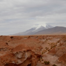 Lava formations, Volcano in the distance, Salt Flats tour Bolivia